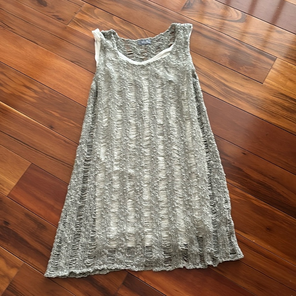 Small two-piece grey dress with white stretchy slip